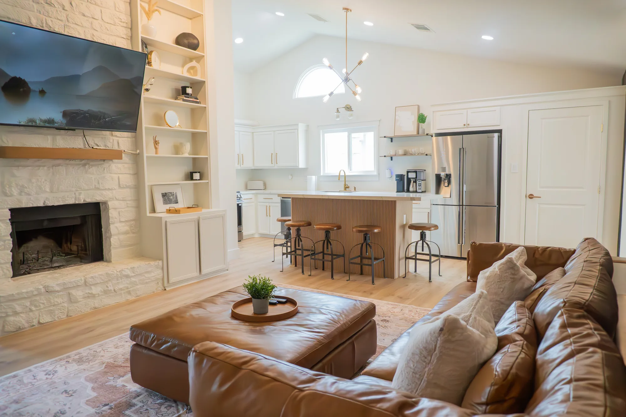 Living room with fireplace and TV